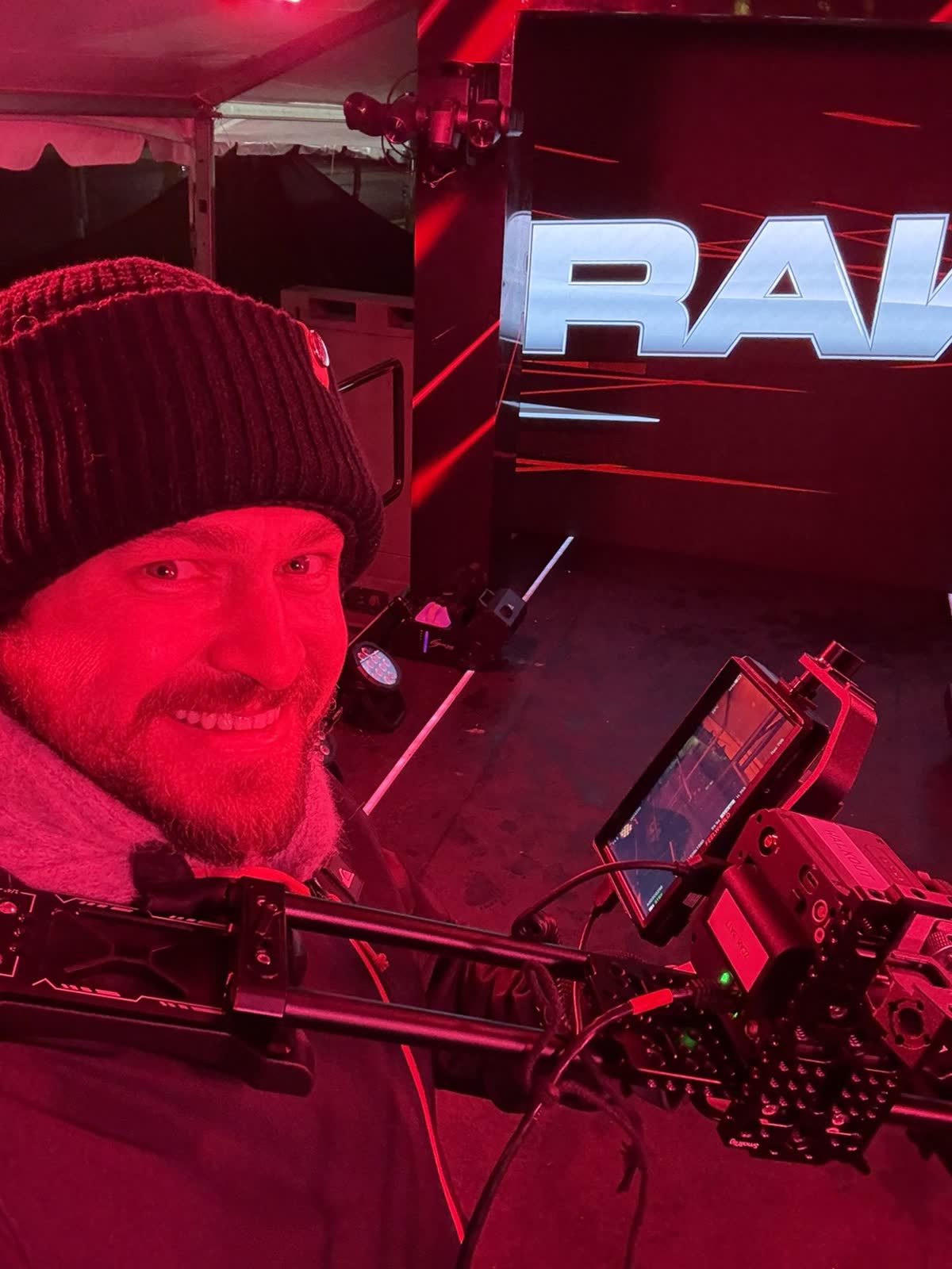 Kyler Fleming behind a camera rig on the WWE Raw set